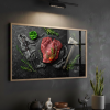Tableau de décoration boucherie avec deux morceau de viande sur une ardoise noir